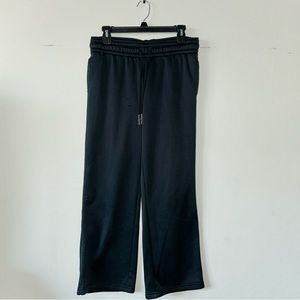 Under Armour large black sweats with pockets. Worn twice. There is a small snag